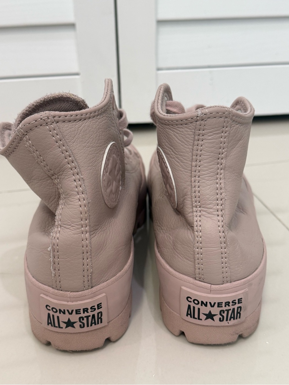 Converse Leather High-Top Sneakers in Dusty Pink